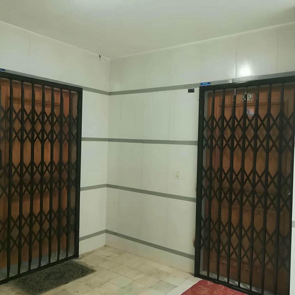 نصب درب آکاردئونی حفاظ آپارتمان چهارگل در شیراز