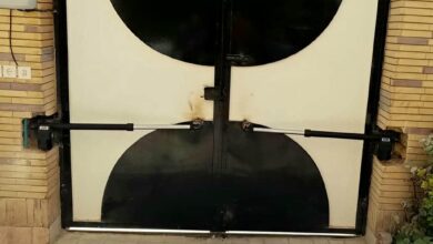جک درب پارکینگ نقره‌ای کنار دفترچه ضمانت در استان زنجان